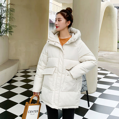 Women's coat hooded in cotton ample and warm loose