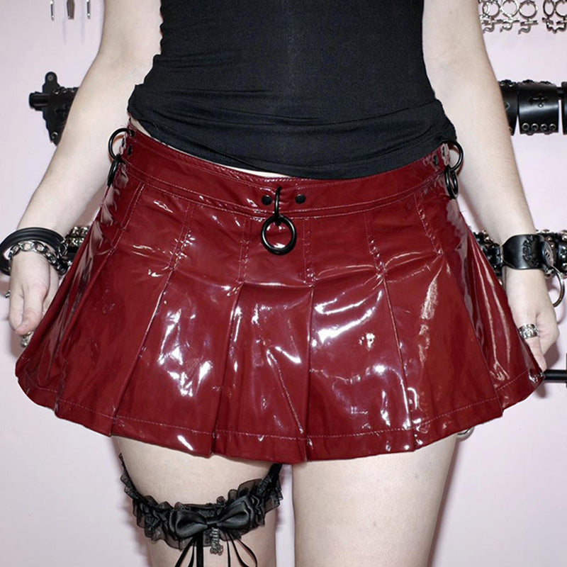 Women's skirt leather shiny pleated patchwork with metal decoration