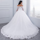 White wedding dress, elegant ,embroidered flowers, lace train