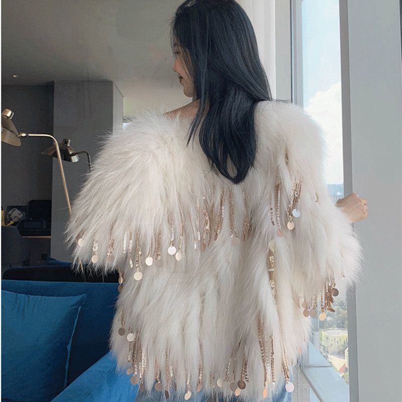 Women's coat in fox fur with beaded fringes elegant versatile