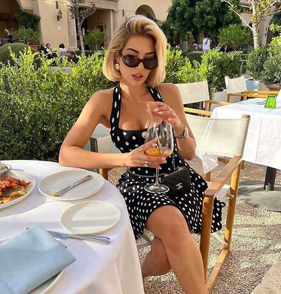 Mini-robe sexy élégante à pois pour femme dos nu sans manches coupe trapèze