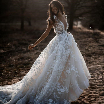 Elegant Bohemian Bridal Gown Featuring a Deep V-Neck, Short Sleeves, Exquisite 3D Floral Appliqués and a Sensual Open Back