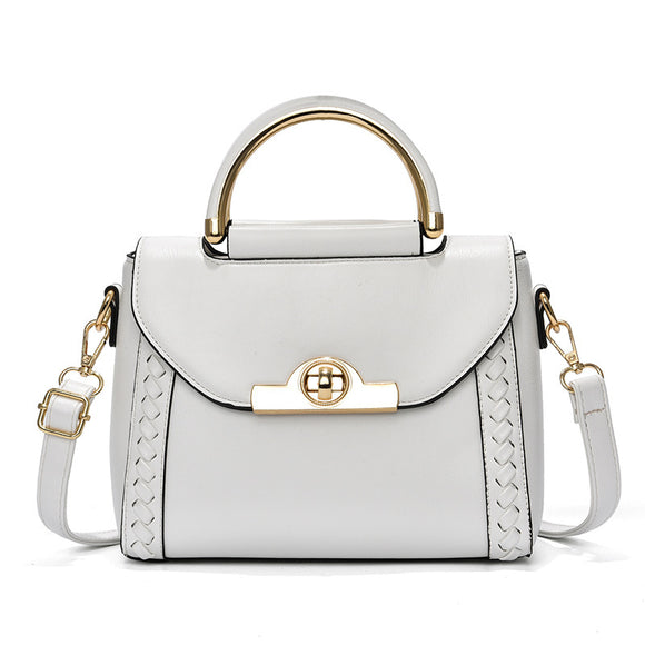 
Bolso de mujer en cuero elegante bandolera con decoración, viajes