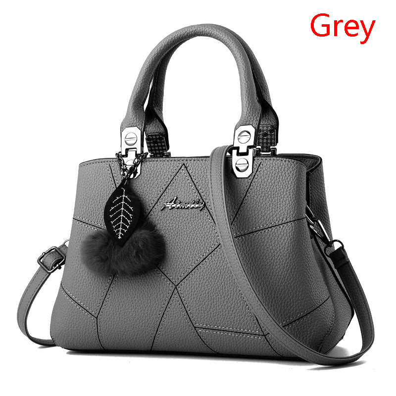 Women's handbag versatile leather zipper top handle with ball pendant