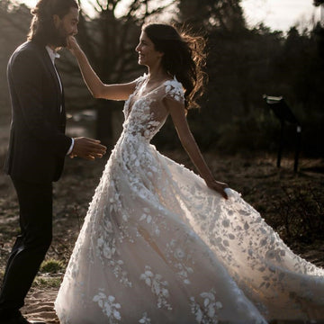 Elegant Bohemian Bridal Gown Featuring a Deep V-Neck, Short Sleeves, Exquisite 3D Floral Appliqués and a Sensual Open Back