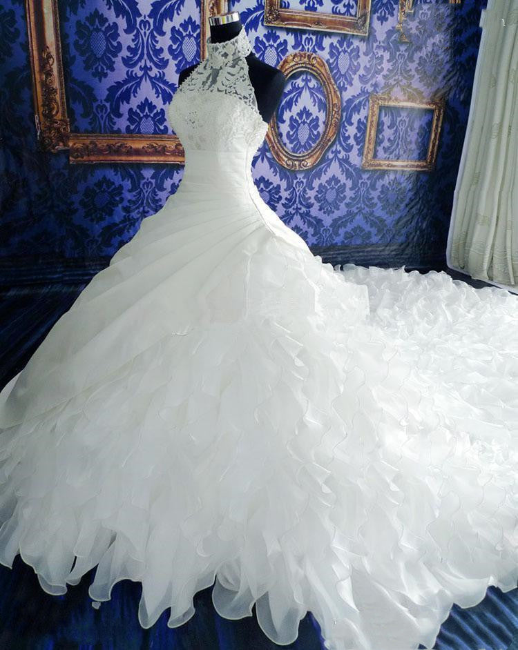 Wedding dress transparent luxury elegant with lace appliques, big tail