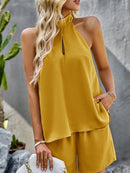 Set Women Two piece halter neck backless top and shorts, sleeveless